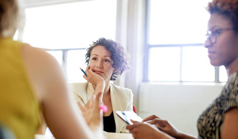 Early and High Growth Oversight case study article Three women in an office meeting